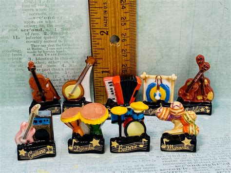 tiny musical instruments violin gong accordion djembe drums banjo