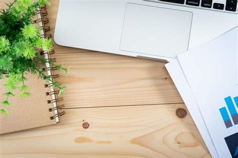 Wooden table with office supplies 10701359 Stock Photo at Vecteezy