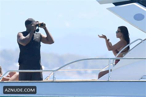 Kourtney Kardashian Wearing A Two Piece Bikini While Enjoying Her Vacation In Sardinia AZNude