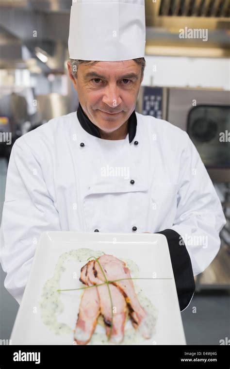 Chef Presenting His Dish Stock Photo Alamy