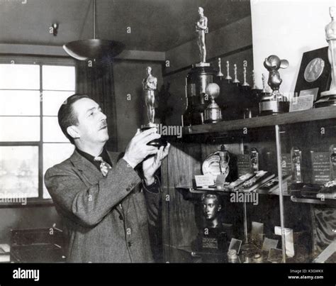 WALT DISNEY with various film awards including Oscars Stock Photo - Alamy