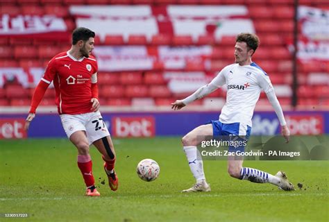 Barnsleys Alex Mowatt And Tranmere Rovers Paul Lewis Battle For The