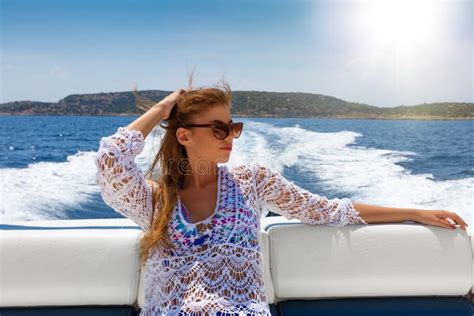 Blonde Woman Enjoys A Boat Ride On A Sunny Day Stock Photo Image Of Looking Girl 122493978