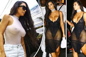 Kim Kardashian Flaunts Derri Re And Ample Cleavage In Eye Popping Thong