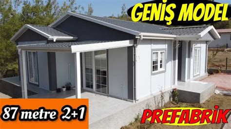 A Small House With The Words Gens Model On It S Front And Side