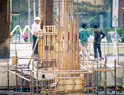 image  construction site  india  dusk  workers people labor