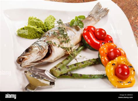 Grilled Fish With Asparagus Stock Photo Alamy