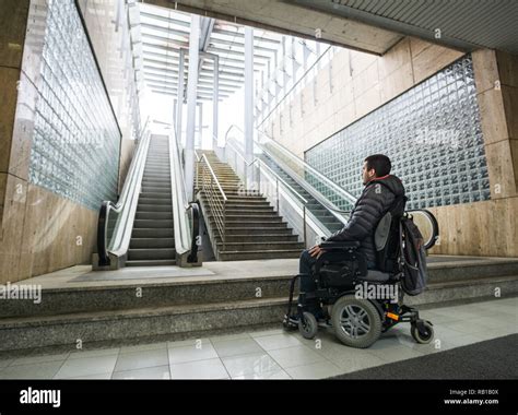 Man Sitting On Escalator Hi Res Stock Photography And Images Alamy