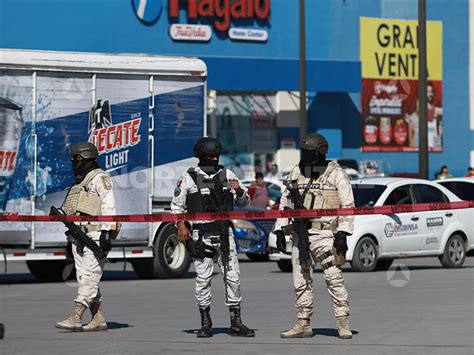 Reportan Otro Asesinato Queda En Una Blazer En Estacionamiento De