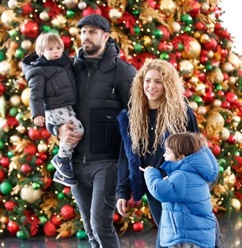 Shakira, Gerard Pique and their sons Milan and Sasha walk through the ...