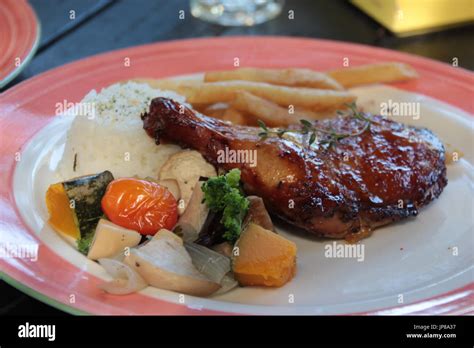 Chicken Rice Plate Garnish With Fries Stock Photo Alamy