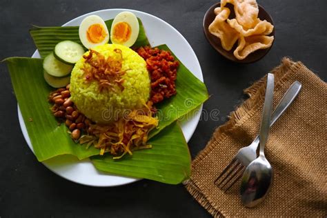 Nasi Kuning Or Yellow Rice Or Tumeric Rice Is Traditional Food From