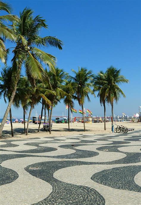 Famous Sidewalk With Mosaic Of Copacabana And Leme Beach In Rio De