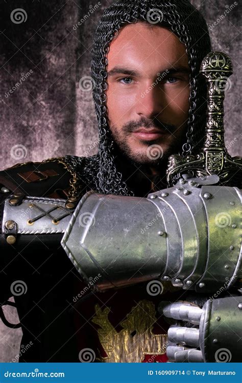 Portrait Of Handsome Medieval Knight In Suit Of Armour With Beard And