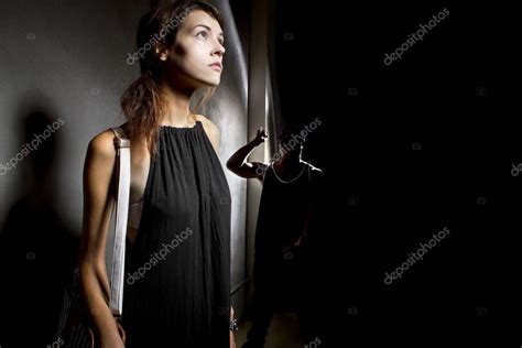 Stalking A Woman Alone Standing Stock Photo Innovatedcaptures 76855037