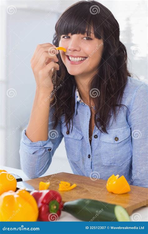 Pretty Brunette Holding Piece Pepper Stock Photos Free Royalty Free Stock Photos From Dreamstime
