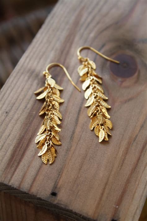 Items Similar To Long Gold Dangling Earrings Delicate Dangling Goddess