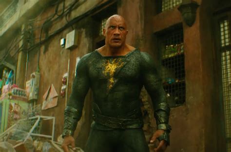 dwayne johnsons egyptian antihero kneels      black