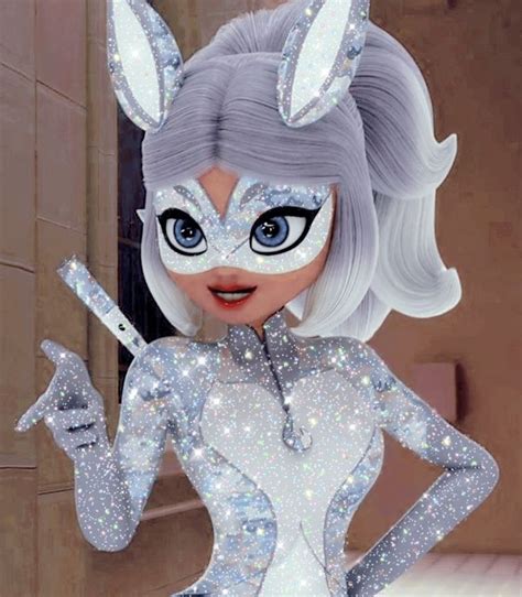 The Animated Character Is Dressed In Silver Glitters And Holding A Cell