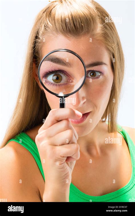 Woman Looking Through Magnifying Glass Or Loupe Stock Photo Alamy