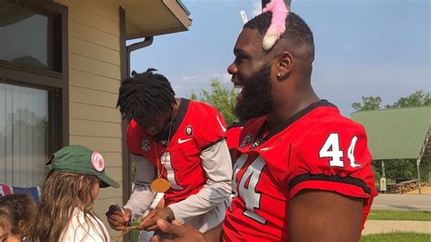 UGA football players surprise kids at Camp Rainbow - Win Big Sports