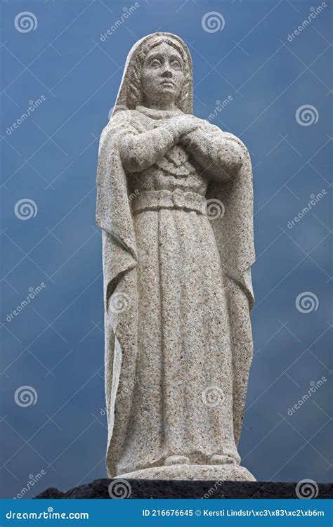 Statue of a praying lady stock image. Image of mother - 216676645