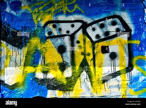 Colorful graffiti on a white brick wall Stock Photo - Alamy