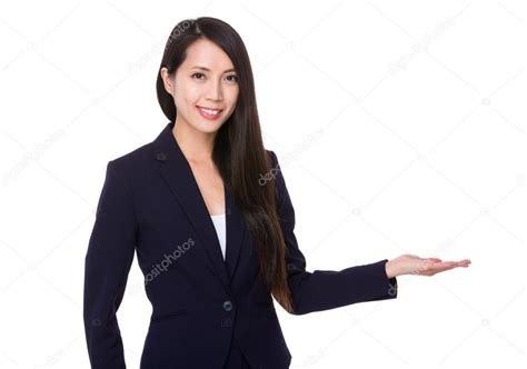 Young asian businesswoman in business suit — Stock Photo © leungchopan ...