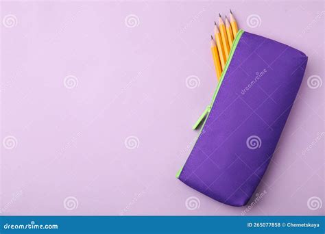 Many Sharp Pencils In Pencil Case On Pink Background Top View Space