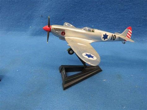 Three WW2 die-cast planes with stands. 1:72 scale. - AAA Auction and Realty