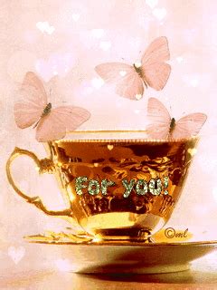 A Golden Tea Cup With Butterflies On It And The Words For You Written