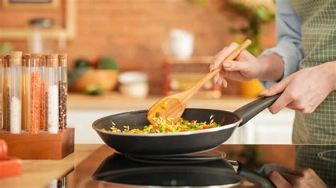 Can you use induction cookware on a regular electric stove?