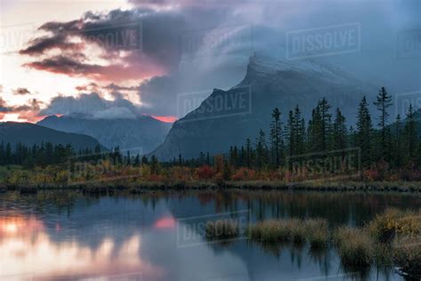 Sunrise And Storm Clouds At Vermillion Lakes With Mount Rundle In