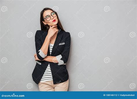 Picture Of Pensive Asian Business Woman In Eyeglasses Looking Up Stock