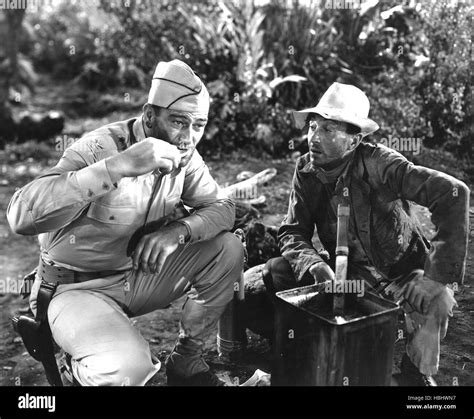 BACK TO BATAAN, John Wayne, Paul Fix, 1945 Stock Photo - Alamy