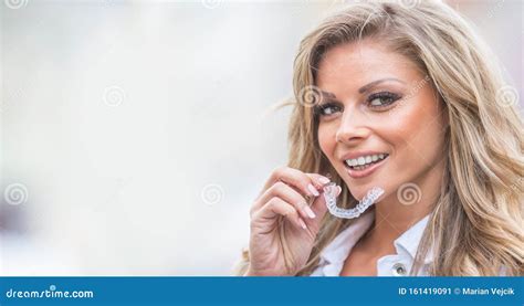 Invisalign Orthodontics Concept Young Attractive Woman Holding