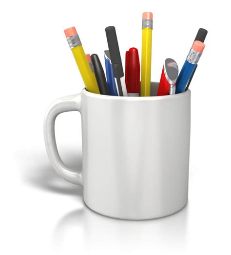 Pencils And Pens In A Cup