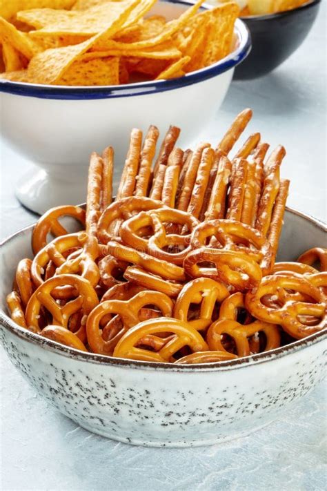 A Bowl Of Salty Snacks Close Up Party Mix With Pretzels And Sticks Stock Image Image Of