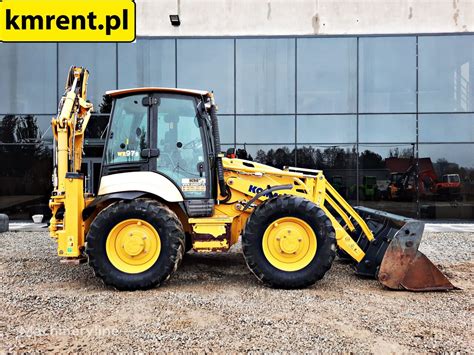 Terna KOMATSU WB 97 R KOPARKO ŁADOWARKA JCB 4CX CAT 444 434 CASE 695