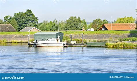 Boat at a Dock in Kinderdijk, Holland Stock Image - Image of dwelling ...