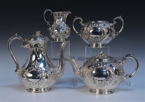 A Victorian Silver Four Piece Tea Set Comprising Teapot Hot Water Pot