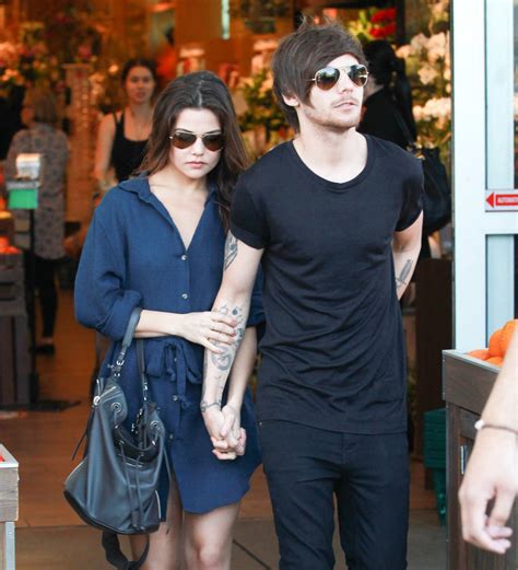 Louis Tomlinson's girlfriend coos about One Direction star's daddy skills | Young Hollywood