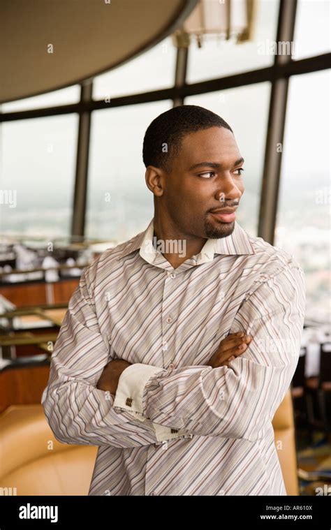 Portrait Of African American Mid Adult Man With Arms Crossed Stock