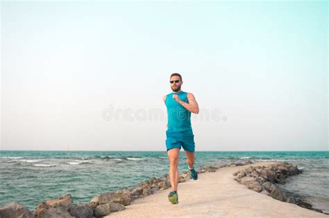 Man In Sportswear Running On Sea Coast Future Success Successful