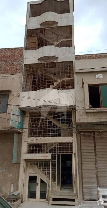 Commercial Building In Mahar Sadiq Market Railway Road Faisalabad Sadiq