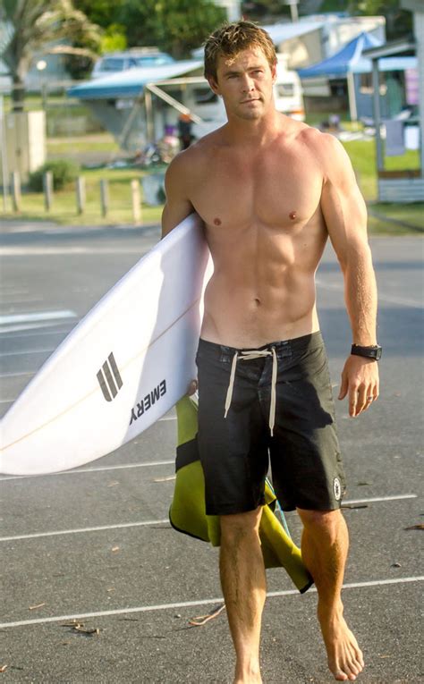 Chris Hemsworth Looks Ridiculously Hot While Flaunting His Washboard Abs At The Beach E News