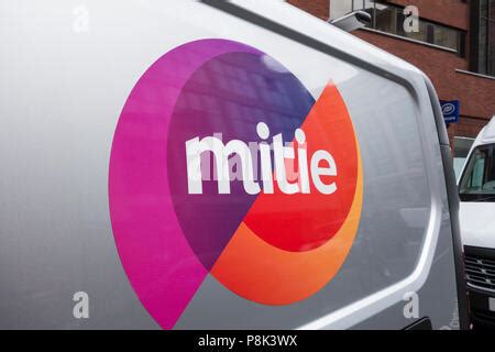 Mitie Group PLC new logo on the side of one of its vans in London, UK Stock Photo - Alamy