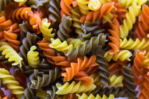 Composition Of Raw Pasta Uncooked Tricolore Fusilli Pasta Twist Shape