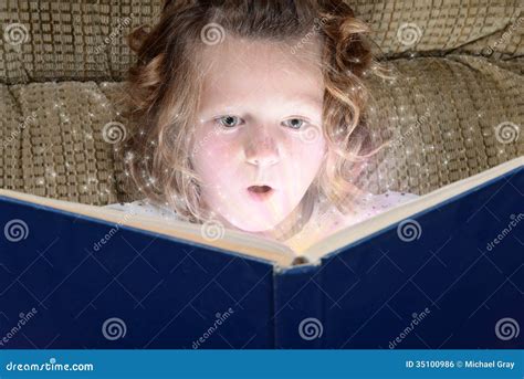 Little Girl Enjoying Magic Of Reading Stock Photo Image Of Beautiful