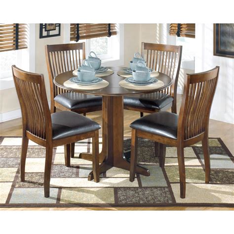 Ashley Stuman Round Drop Leaf Table Dining Tables Furniture